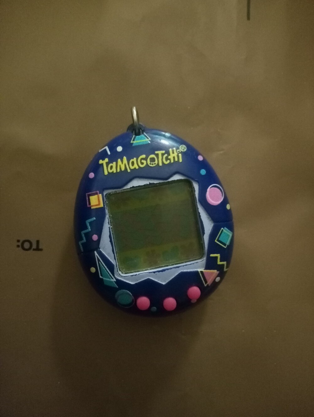 Original Bandai Tamagotchi Gen 1 Re-Release - Retro 90s Geometric Shell Design